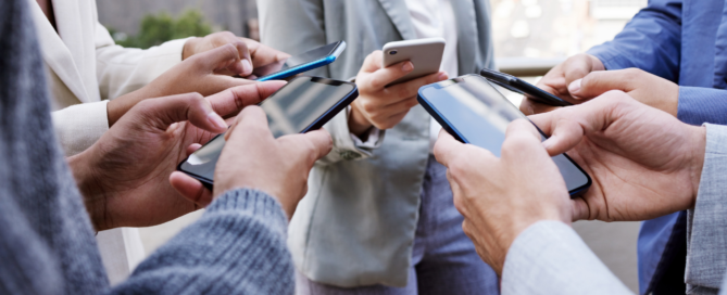 people and group with phone in hands typing email, reminder or sharing contact info.
